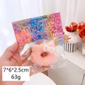 Rosa Katzen-Donut-Squishy mit weißer Schleife, weiches PINCH Stressabbau-Spielzeug - Hello Kitty Rosa Donut