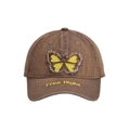Close-up of butterfly embroidery and Free Flight text on a brown denim baseball cap - Brown