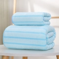 Light blue striped coral fleece towel set with soft thickened texture on a table - Broad & Narrow Stripe / Towel (35*75cm) / Blue