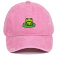 Close-up of pink washed cotton baseball cap with detailed green frog embroidery - Pink