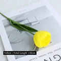 Lebensechte gelbe PU-Tulpe Kunstblume mit grünem Stiel auf minimalistischem Magazin - Gelb