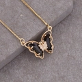 Macro shot of 18K gold butterfly necklace featuring black enamel wings and zircon center - 7#Black
