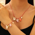 Detail of hand-woven cord necklace and bracelet set with colorful seashells and starfish - Red Necklace and Bracelet Set