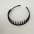 Classic black plastic headband featuring non-slip internal teeth for secure hair styling - Black