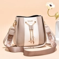 Fashionable beige and brown bucket bag with gold chain tassel and wide jacquard strap - Khaki and White