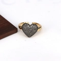 Macro shot of gold adjustable heart ring featuring inlaid dark micro zircon stones - Adjustable Open / Silver