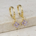 Detail view of gold hoop earrings with purple flower zircon petals and S925 hallmark - Gold-Purple Zirconia