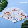 Portable folding fan with lucky cat cartoon illustration and white plastic ribs - Lucky Cat