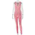 Detail of pink leopard print jumpsuit with sleeveless design and slim fit silhouette - S / Red Leopard