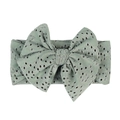Infant headband with large light green bow and hollow-out embroidery detail - Green