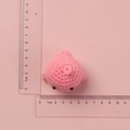 Pink handmade crochet whale keychain charm 4cm size on matching pink background - Pink Little Whale Doll