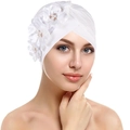 Elegant white pleated turban hat with three 3D fabric flowers and pearl accents - White
