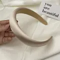 Padded champagne gold satin headband with elegant matte texture for a high-volume look - Apricot