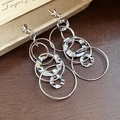 Silver geometric hollow hoop earrings with layered hammered texture on wood surface - 2# Silver Pin-Silver-Round