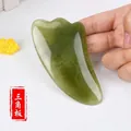 Green resin facial Gua Sha tool in rounded triangle shape for face lifting and massage - Triangle Plate / Green