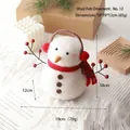 Handmade wool felt snowman figurine with red scarf and earmuffs for Christmas decor - No. 12 (Medium Snowman with Red Earmuffs)