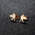 Polished gold stainless steel bird stud earrings in minimalist flying swallow design - Flying Bird / Rose Gold