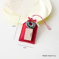 Red felt Christmas house ornament with green wreath, mini bow and wooden door detail - Red House