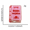 Embroidered pink book worm patch with dimensions for clothing and bag decoration - Style 8 (Book Worm)