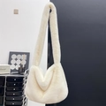 Chic cream white faux fur hobo shoulder bag with plush wide strap for winter season - White