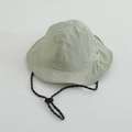 Detail of light green quick-dry sun hat showing breathable fabric and adjustable chin strap - 52cm / Bean Green