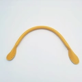 Detail of yellow leather handbag handle with pre-punched stitching holes for DIY repair - Yellow