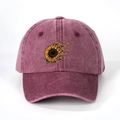Detailed close-up of sunflower and butterfly print on washed burgundy denim baseball cap - One Size (Adjustable) / Burgundy