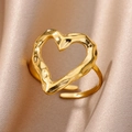 Adjustable gold heart ring with irregular lava texture on champagne silk background - Gold Lava Heart