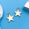 Two KC gold star-shaped hollow charms for DIY jewelry making on a blue background - 1pc KC Gold Five-Pointed Star 12x14mm