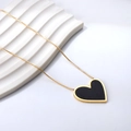 Chic gold-plated stainless steel necklace featuring a bold black heart shell pendant - Gold + Black Heart (NE2B060BG)