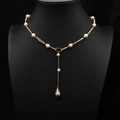 Collier de perles doré en Y élégant avec grand pendentif perle mauve sur support noir - Chaîne de Pull en Métal Multi-rangs