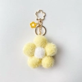 Porte-clés fleur en peluche jaune et blanc avec mousqueton en métal doré - Petite fleur jaune