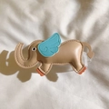 Detailed view of elephant shaped faux leather phone case charm in beige and blue - Back Clip Only / Milk Coffee