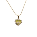 Détail du collier cœur doré avec œil en émail vert et pierres de zircon brillantes - Chaîne serpent 50VM / Light jaune