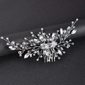 Detail of silver bridal hair comb with emerald crystals and beads in floral design - White Crystal + Silver Wire