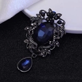 Baroque brooch with dark blue oval gemstone and teardrop pendant in black alloy frame - Gun Black Dark Blue Gem