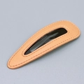 Teardrop-shaped leather BB hair clip in beige with elegant stitching and metal snap - Teardrop Orange