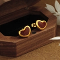 Elegant gold-plated heart stud earrings in wine red finish on wooden box display - Wine Red Heart