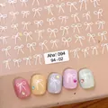 Self-adhesive white bow nail stickers with 3D ribbon designs for manicure art - Aha-9402 White Bows
