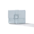 Portafoglio corto da donna azzurro in ecopelle con eleganti cuciture decorative - Blu