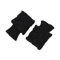 Close-up of black chunky knit leg warmers with hollow crochet pattern and ribbed cuffs - One Size / Black