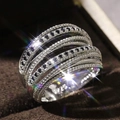 Anello multistrato intrecciato in argento S925 con zirconi bianchi e neri incastonati - US 7 / Zircone Nero