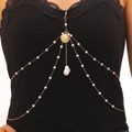 Detail of gold pearl body chain with a shell pendant on a black lace top - Shell Style (01 KC Gold)