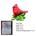 Small resin cardinal bird figurine with berries, dimensions 4.3x2.5x4.3 cm and net weight 17.3g - Small