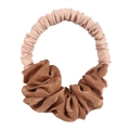 Detailed shot of dual-tone satin hair scrunchie in beige and bronze with pleated texture - Coffee Dual-color