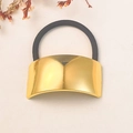 Minimalist black elastic hair tie with a wide polished gold metal cuff on white background - Gold Wide Smooth Buckle