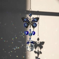 Blue Evil Eye butterfly crystal suncatcher hanging with rainbow prism light effect - Butterfly Evil Eye
