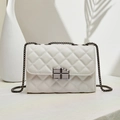 Chic white quilted chain bag featuring a unique chocolate bar shaped metal clasp - White