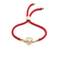Adjustable red cord bracelet featuring a gold heart pendant with zircon stones - Red Rope