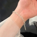 Elegant silver Figaro chain bracelet for women with adjustable length and glossy finish - Figaro Chain Style (MY31260)